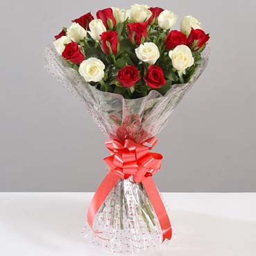 Arrangement of White and Red Roses